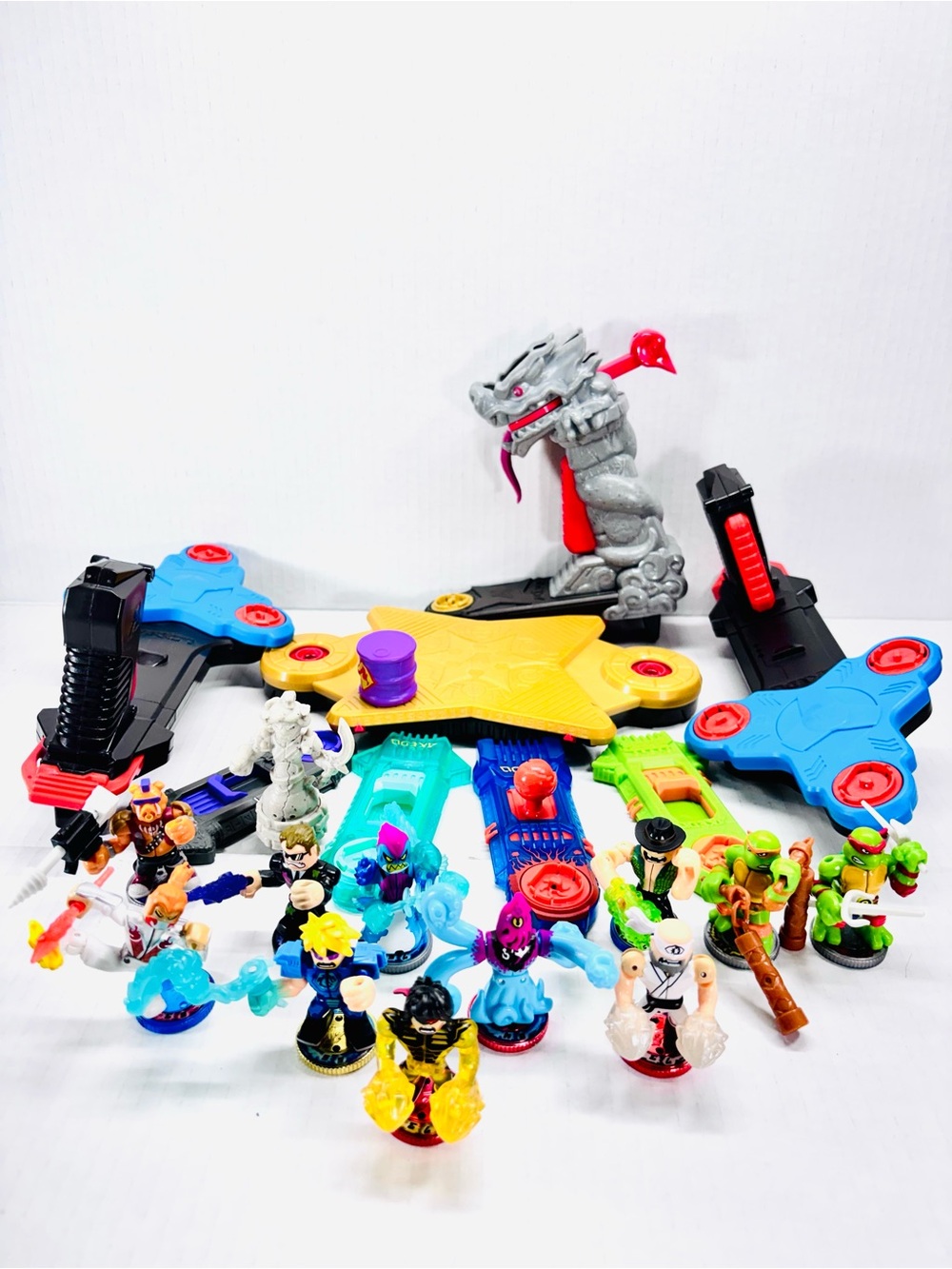 Lot of 12 Akedo Ultimate Arcade Warriors With 7 Controllers